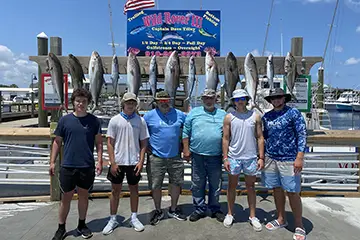 Anglers with Amberjack on Wild Rover III live bait charter boat in Carolina Beach NC